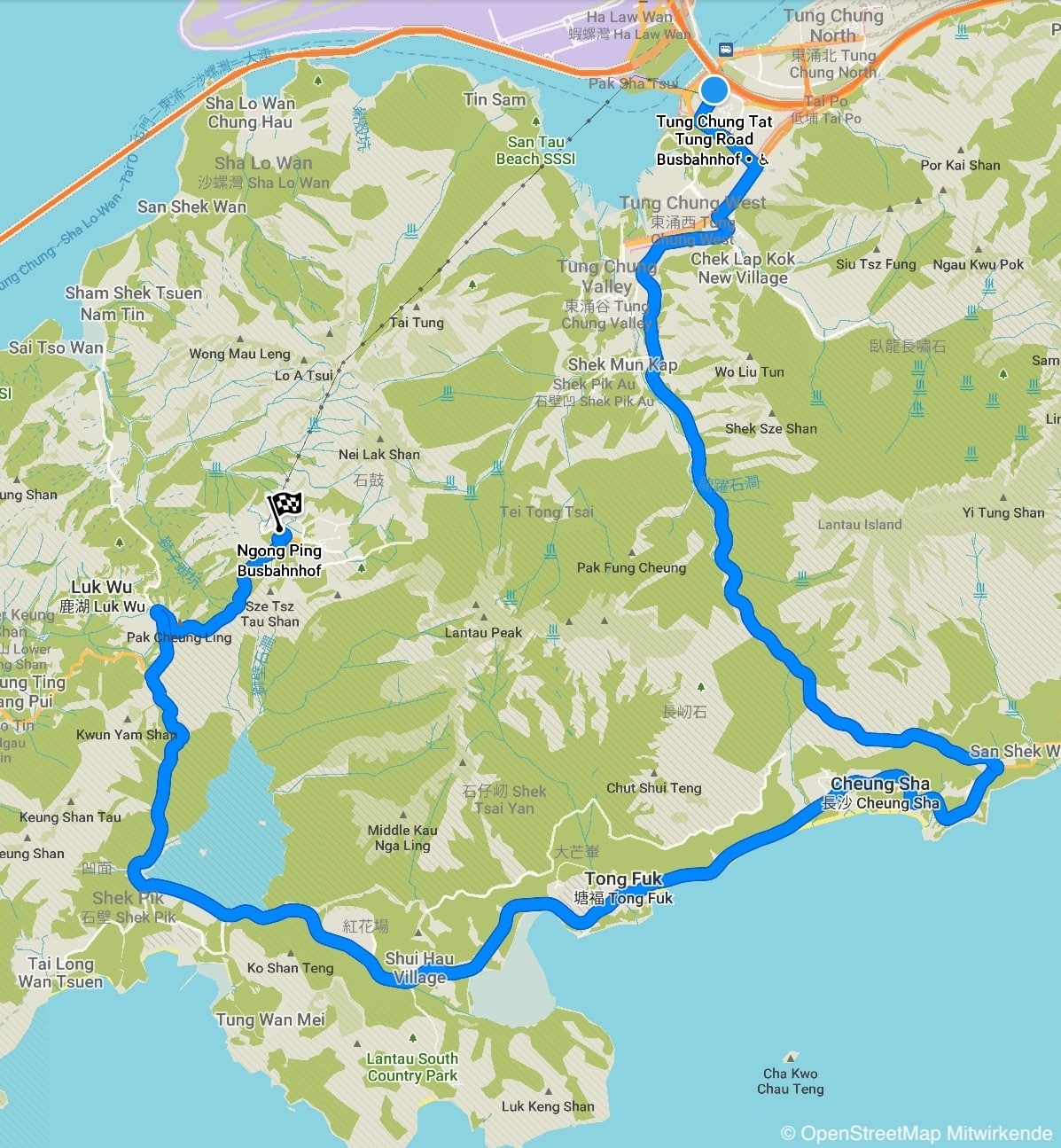 Karte der Insel, die die Strecke zeigt, die ein Bus fahren muss um auf dem Berg zu fahren. Sie führt über Berge zum Süden der Insel, macht dort einen engen schlecnker nach Osten um dann an der Südküste nach Westen zu fahren und dann wieder nach Norden auf den Berg. Überall enge kurven.